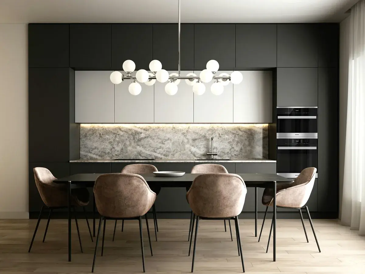 Dining area with marble backdrop and sculptural pendant lighting in Puppalaguda, Hyderabad Dining area with marble backdrop and sculptural pendant lighting in Puppalaguda, Hyderabad